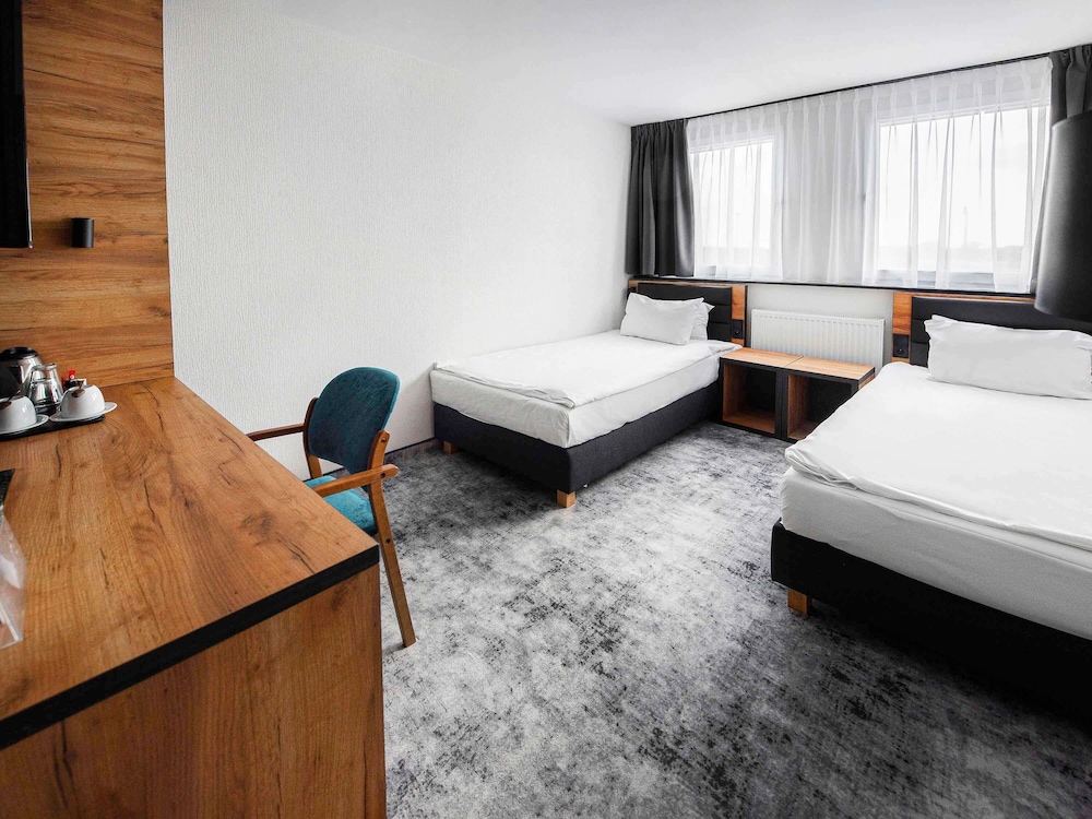 Habitación Superior con Dos Camas Individuales del hotel Mercure Opole. Foto 6
