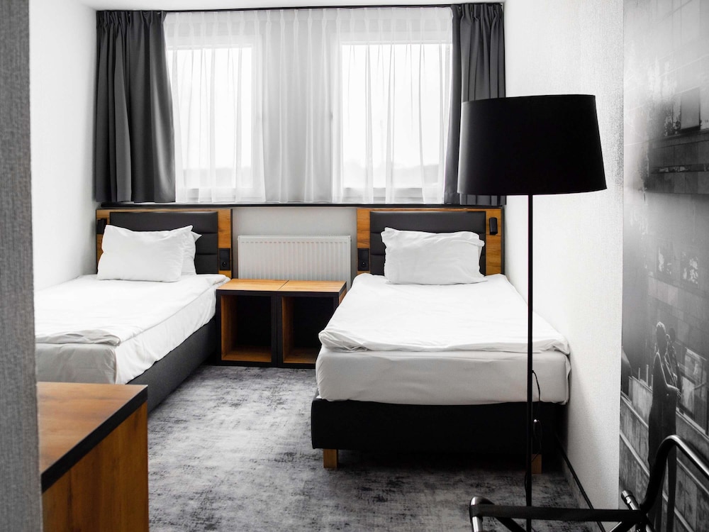 Habitación Superior con Dos Camas Individuales del hotel Mercure Opole. Foto 7