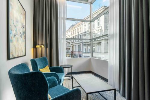 Habitación Business con cama extragrande del hotel Wyndham Wroclaw Old Town. Foto 1