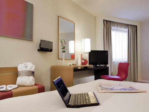 Habitación Doble Executive con sofá cama del hotel Novotel Sheffield Centre. Foto 3
