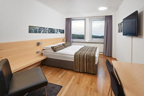 Habitación con cama grande del hotel Reykjavik Natura - Berjaya Iceland Hotels