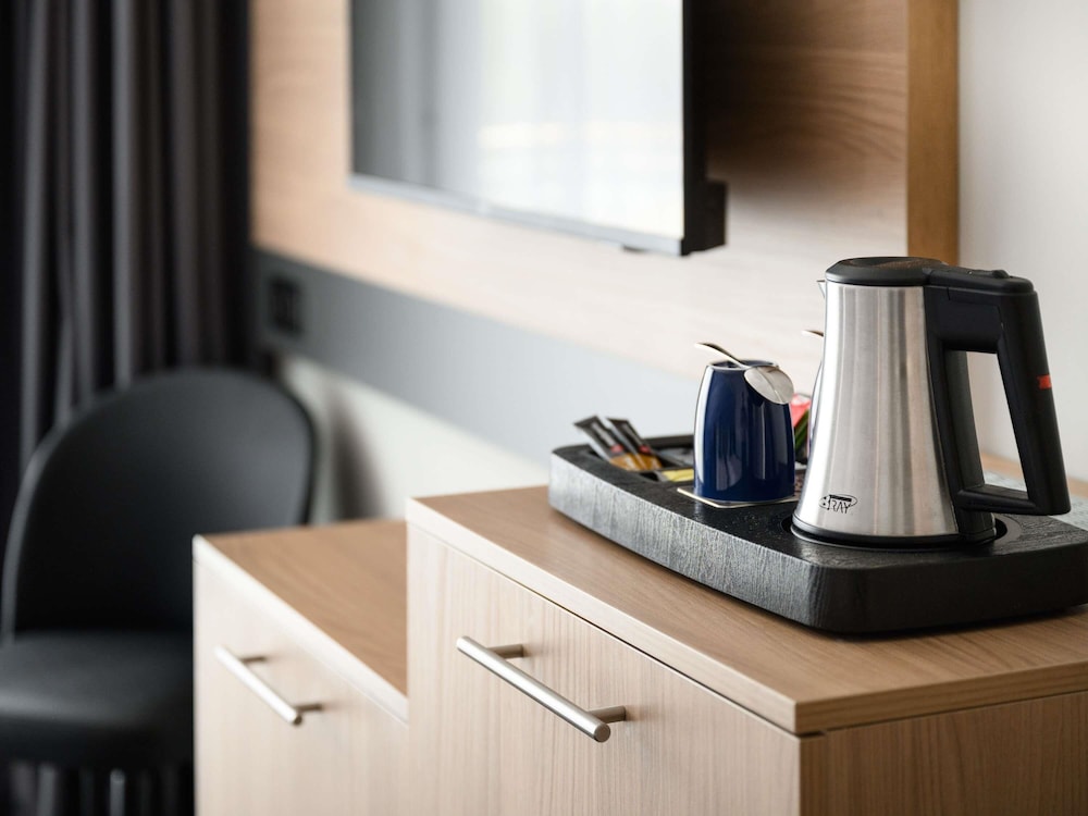 Habitación superior con 2 camas individuales del hotel Novotel Szeged. Foto 1