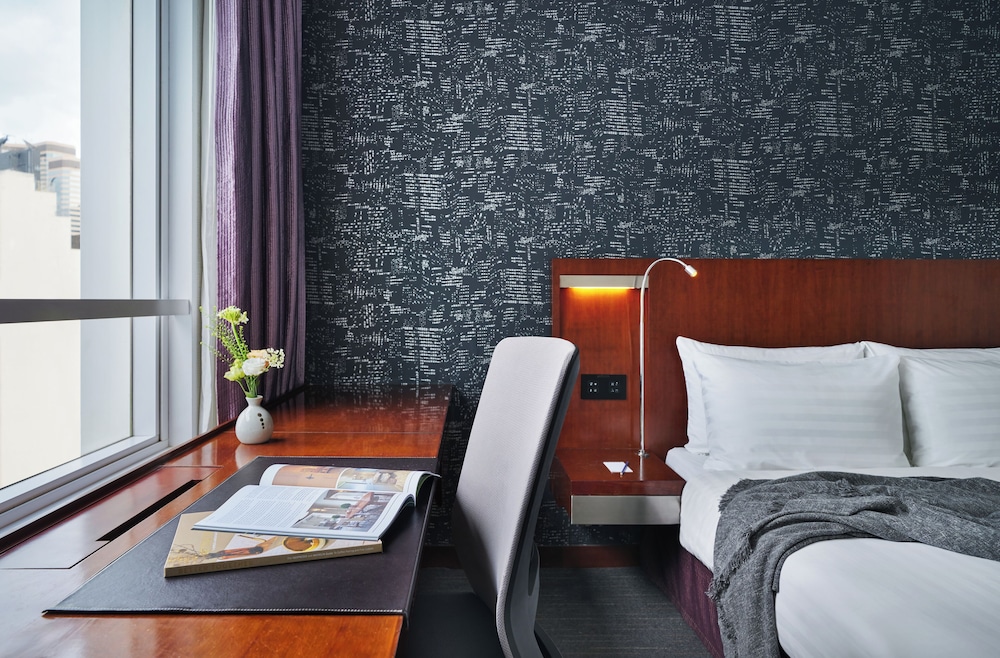 Habitación superior, 1 cama de matrimonio del hotel Novotel Century Hong Kong. Foto 1