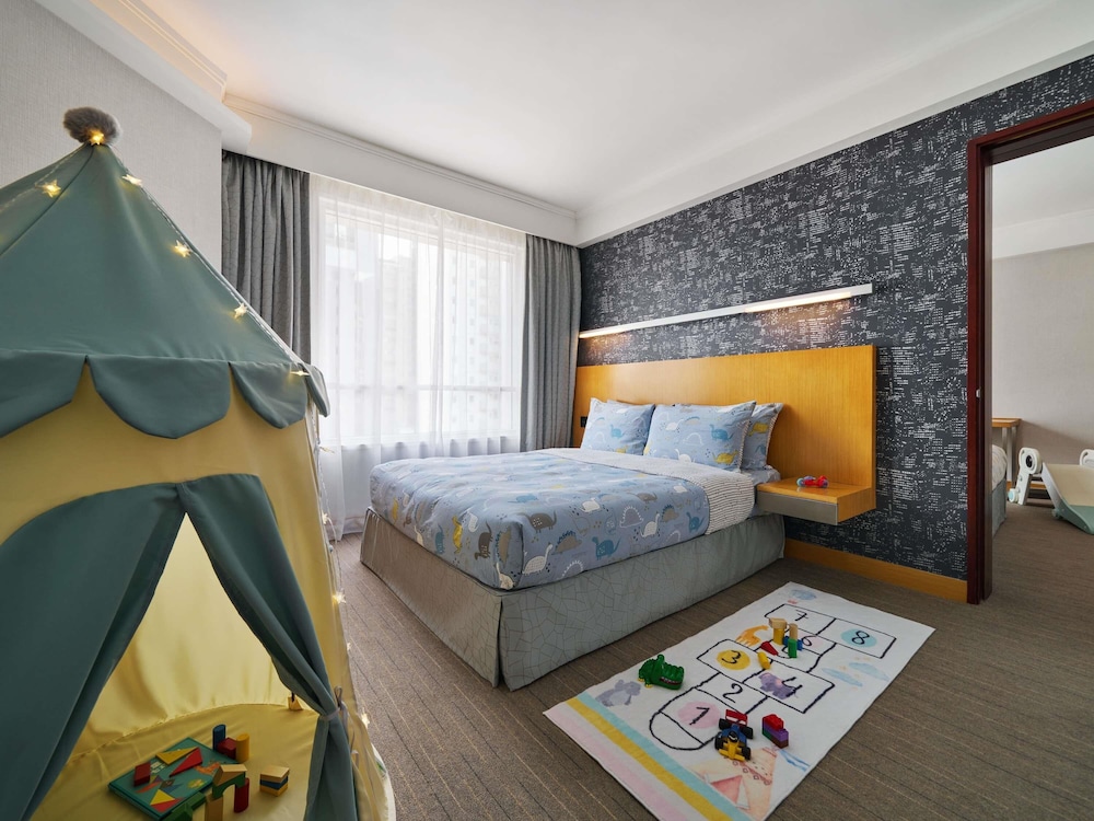 Junior Suite, 1 Queen Bed del hotel Novotel Century Hong Kong. Foto 13