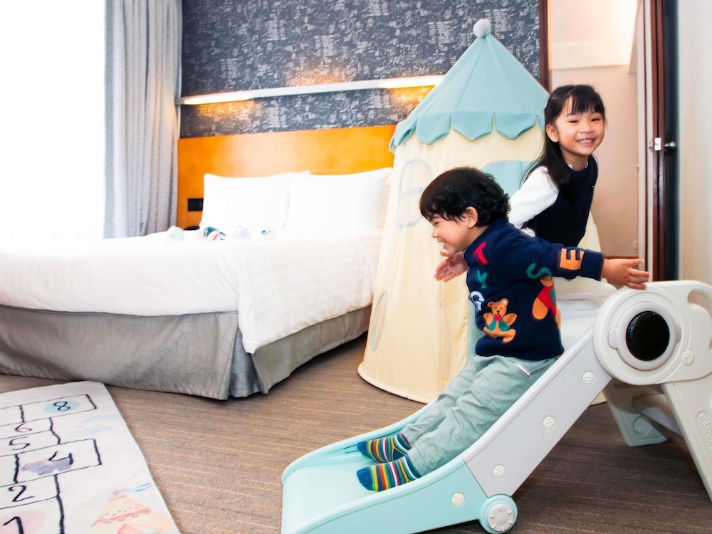 Junior Suite, 1 Queen Bed del hotel Novotel Century Hong Kong. Foto 15