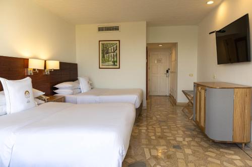 Alojamiento - 2 camas dobles del hotel Hotel Caribe by Faranda Grand, a member of Radisson Individuals. Foto 1