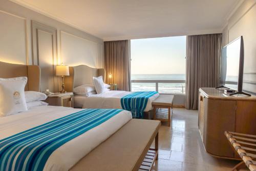 Habitación Superior con vistas al mar - 2 camas grandes del hotel Hotel Caribe by Faranda Grand, a member of Radisson Individuals. Foto 1