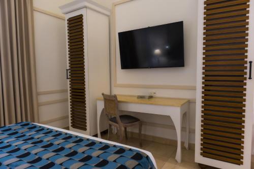 Habitación Premium - 2 camas Individuales del hotel Hotel Caribe by Faranda Grand, a member of Radisson Individuals. Foto 1