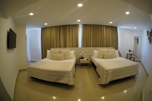 Habitación Doble con vistas al mar del hotel Dorado Plaza Bocagrande. Foto 1