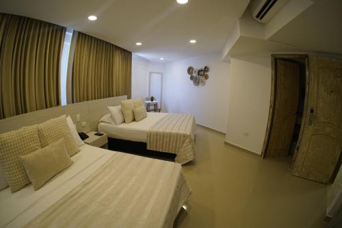Habitación Doble con vistas al mar del hotel Dorado Plaza Bocagrande. Foto 4