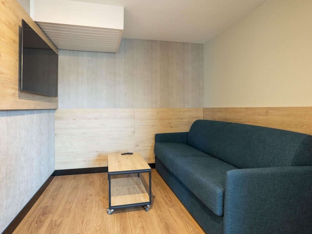 Habitación familiar, varias camas del hotel Ibis Angouleme Nord. Foto 2