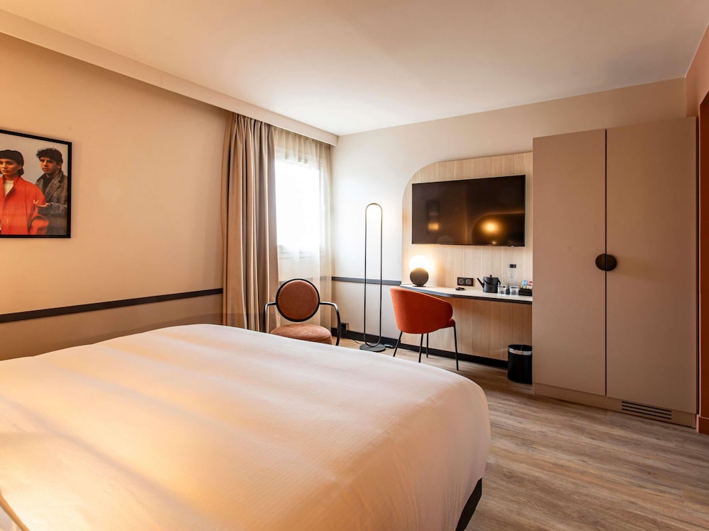Habitación doble con cama queen - size del hotel Mercure Angouleme De France. Foto 4