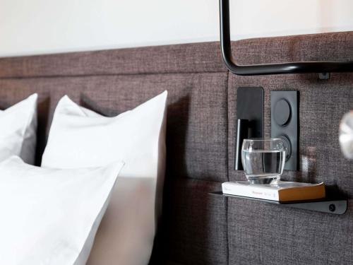 Habitación Comfort con 2 camas individuales que forman 1 cama doble y 1 sofá - cama individual del hotel Novotel Belfort Centre Atria