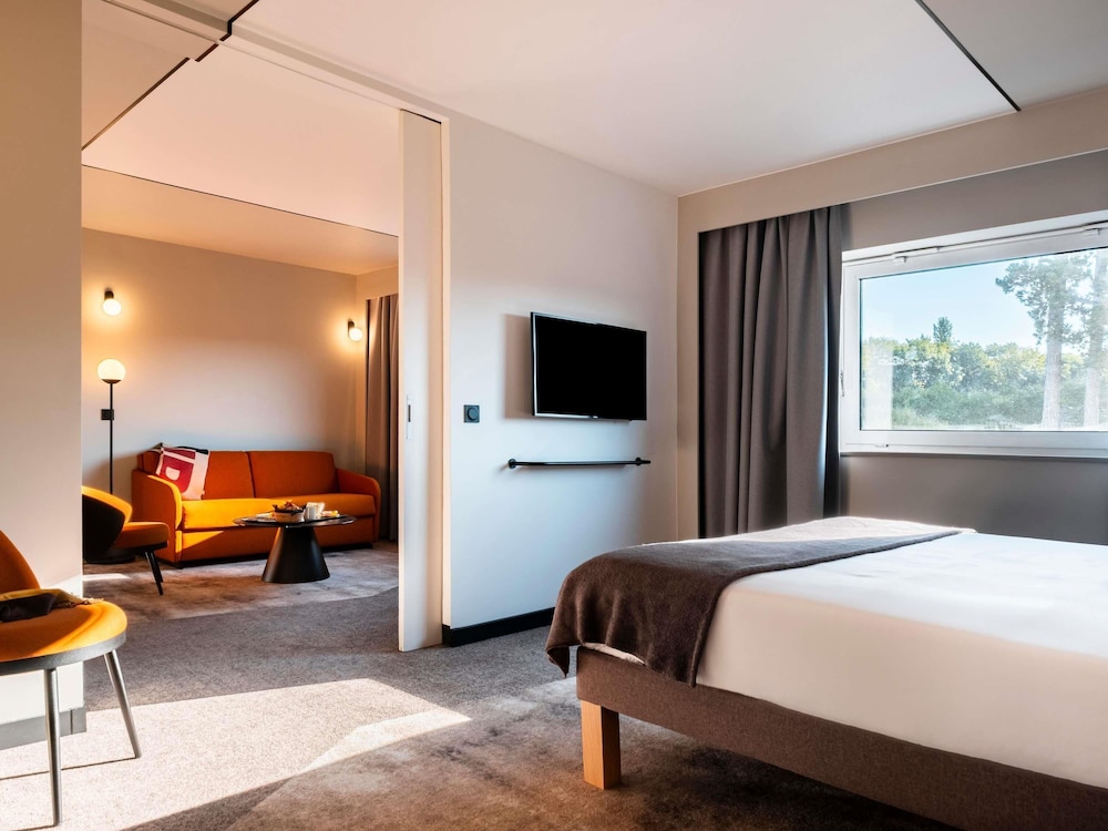 Suite con 1 cama doble y 1 sofá - cama doble del hotel Novotel Belfort Centre Atria