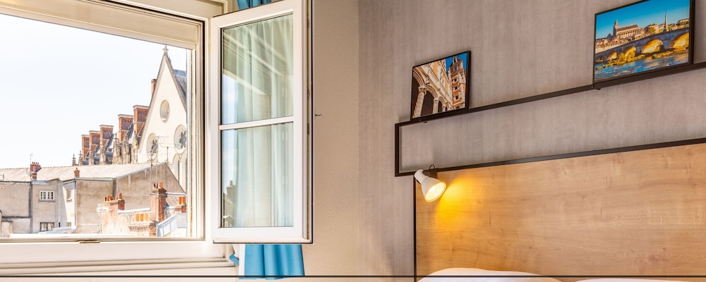 Habitación con cama doble. Diseño nuevo del hotel ibis Blois Centre Chateau. Foto 1