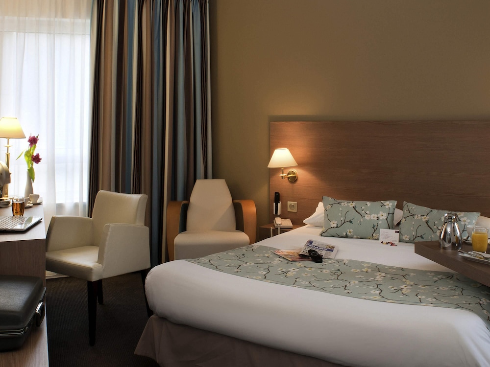 Habitación Superior con 2 camas zip y 1 cama individual del hotel Mercure Forbach