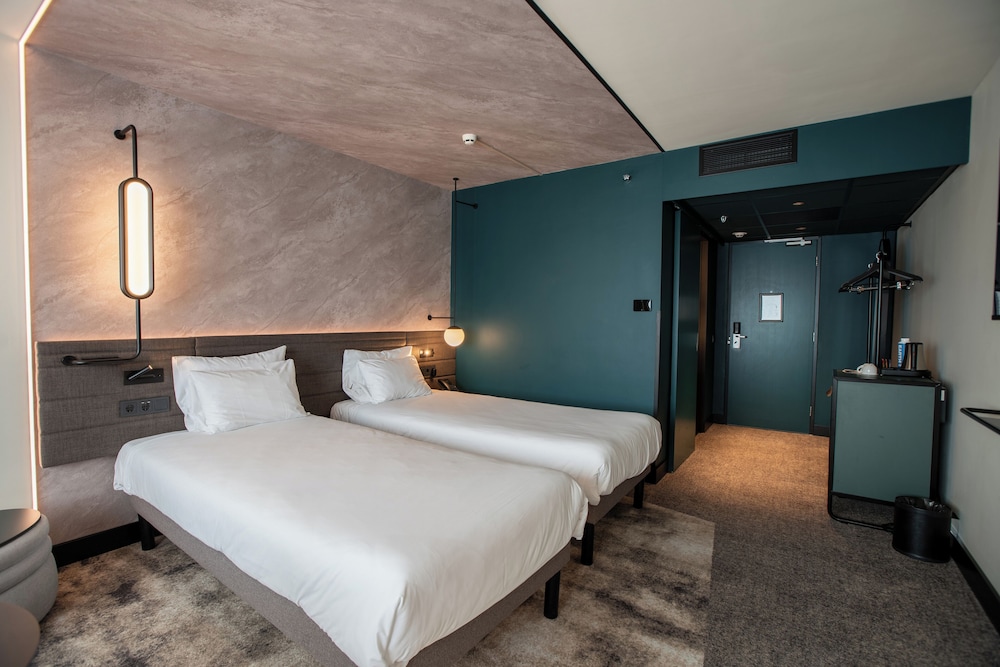 Habitación superior (2 single beds and sofa) del hotel Novotel Rotterdam Brainpark. Foto 5