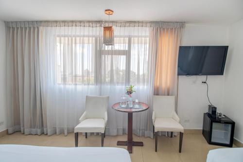 Habitación Doble con 2 camas dobles - No fumadores del hotel Faranda Express Soloy and Casino. Foto 1