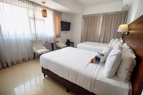 Habitación Doble con 2 camas dobles - No fumadores del hotel Faranda Express Soloy and Casino. Foto 3