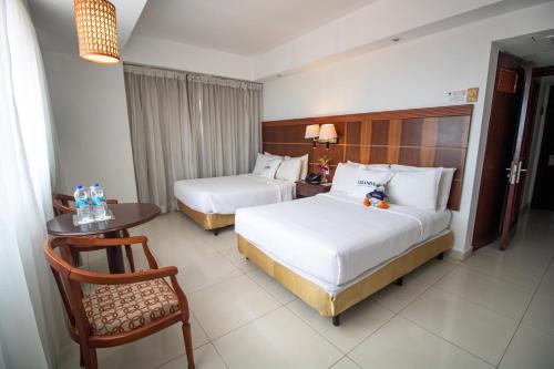 Habitación Doble con 2 camas dobles - No fumadores del hotel Faranda Express Soloy and Casino. Foto 4