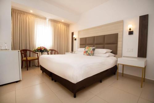Habitación Doble Superior con vistas a la ciudad del hotel Faranda Express Soloy and Casino. Foto 1