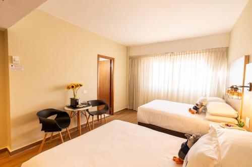 Habitación doble Superior Vista ciudad 2 Camas dobles del hotel Faranda Express Soloy and Casino. Foto 2
