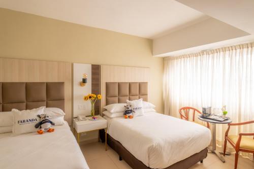 Habitación doble Superior Vista ciudad 2 Camas dobles del hotel Faranda Express Soloy and Casino. Foto 3