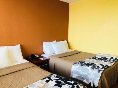 Habitación Doble con 2 camas dobles - No fumadores del hotel The Vue Express. Foto 8