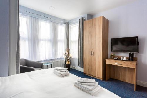 Habitación con cama extragrande. del hotel Wellesley. Foto 3