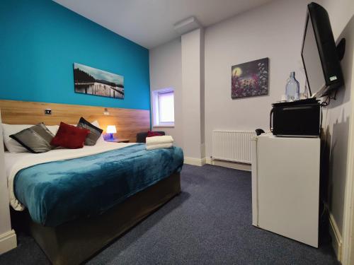 Habitación con cama extragrande. del hotel Wellesley. Foto 9