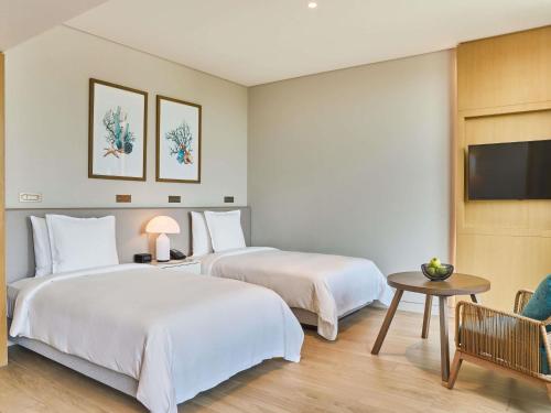 Single Junior Suite with Private Terrace - Beachfront del hotel Mövenpick Resort Al Marjan Island