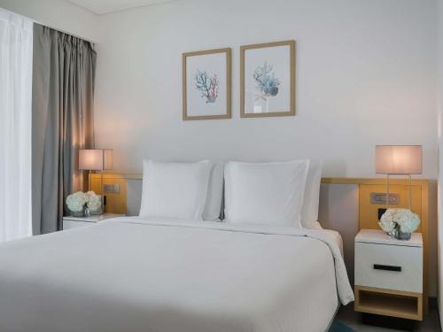 Suite Esquinera del hotel Mövenpick Resort Al Marjan Island. Foto 4