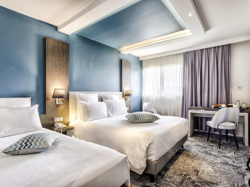Habitación clásica con cama doble y individual y acceso al spa del hotel Mercure Cabourg and Spa