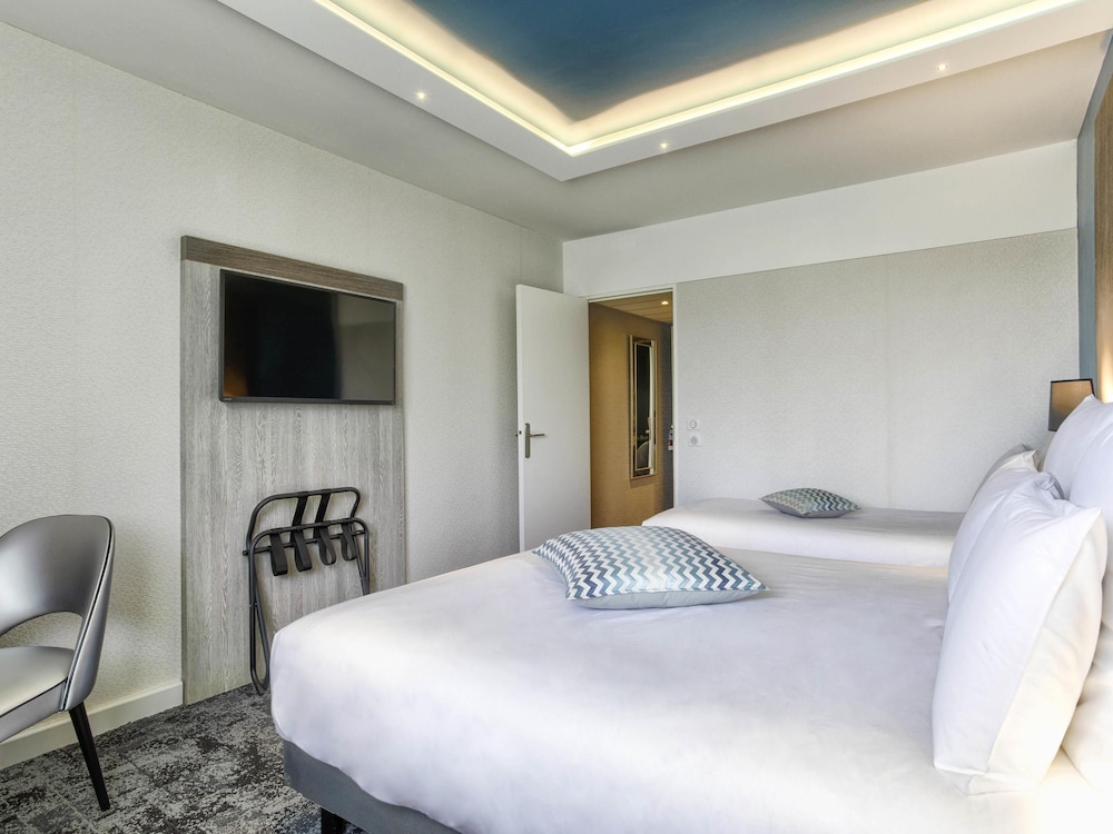 Habitación clásica con cama doble y individual y acceso al spa del hotel Mercure Cabourg and Spa. Foto 2