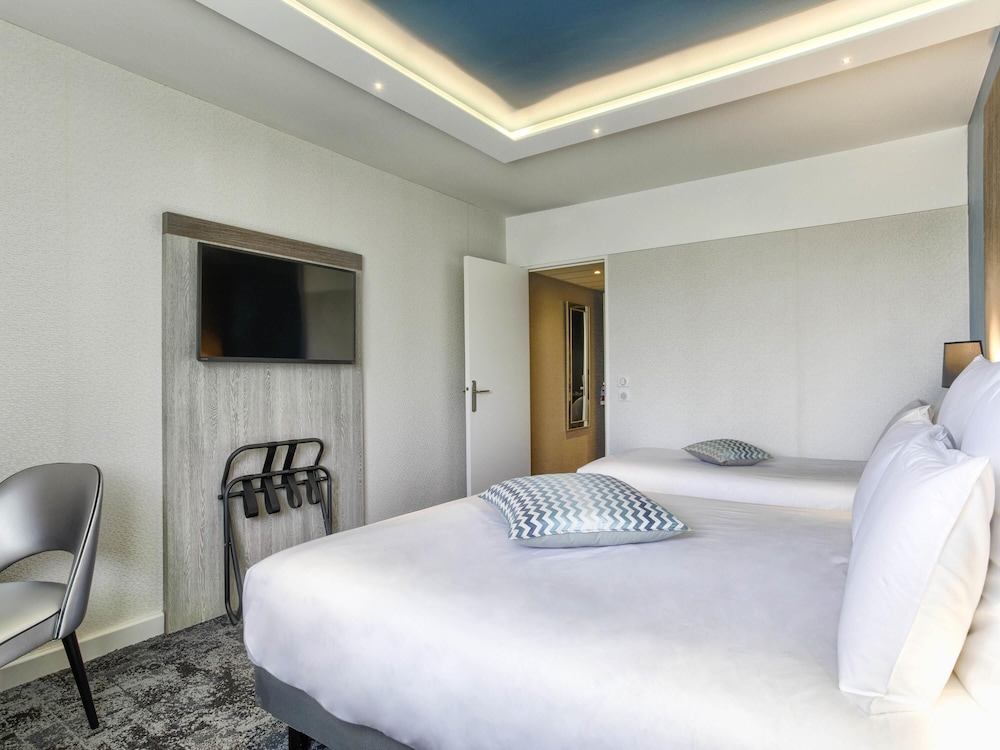 Habitación clásica con cama doble y individual y acceso al spa del hotel Mercure Cabourg and Spa