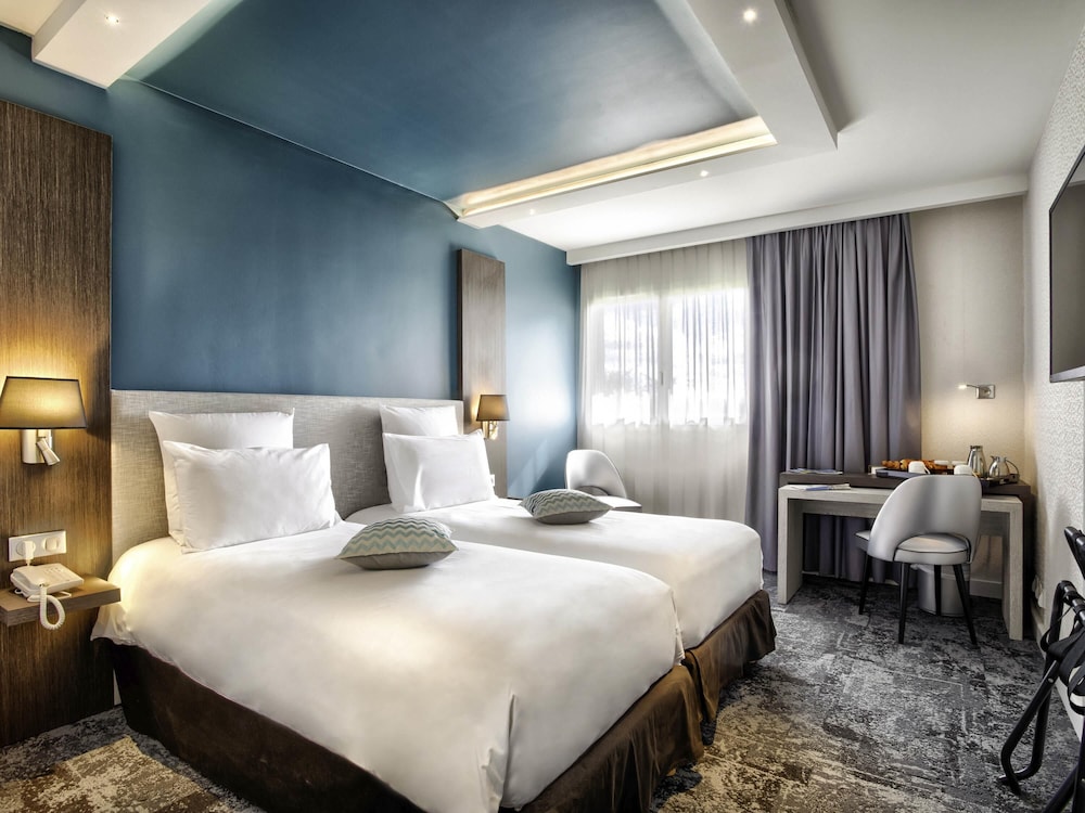 Habitación clásica con 2 camas individuales, y acceso al spa del hotel Mercure Cabourg and Spa