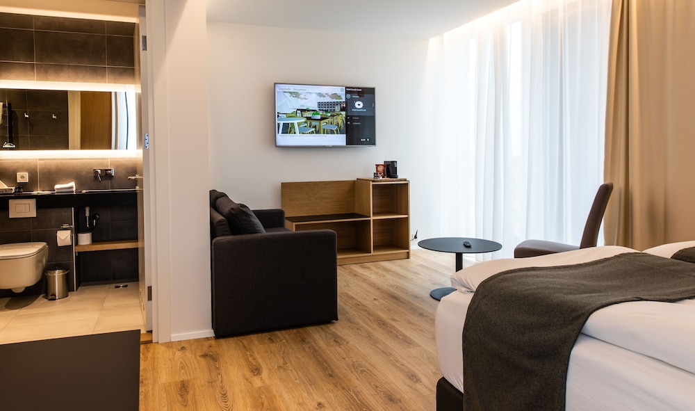 Habitación superior con 1 cama doble o 2 individuales del hotel South Coast. Foto 5