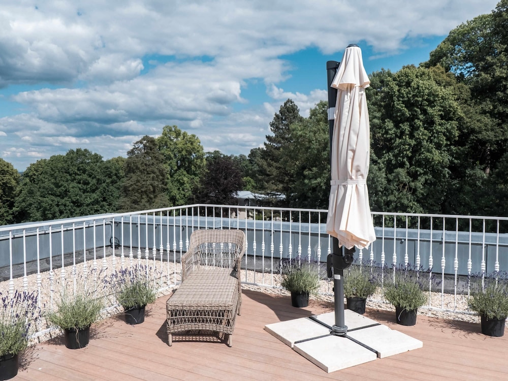 Suite Deluxe tipo dúplex con cama doble y terraza de 25 m² del hotel Novotel Domaine De Maffliers - Demeure De Campagne