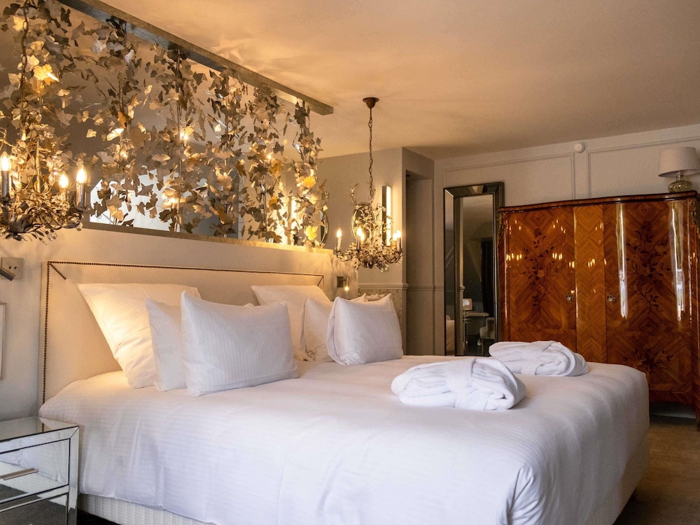 Suite Deluxe tipo dúplex con cama doble y terraza de 25 m² del hotel Novotel Domaine De Maffliers - Demeure De Campagne. Foto 11