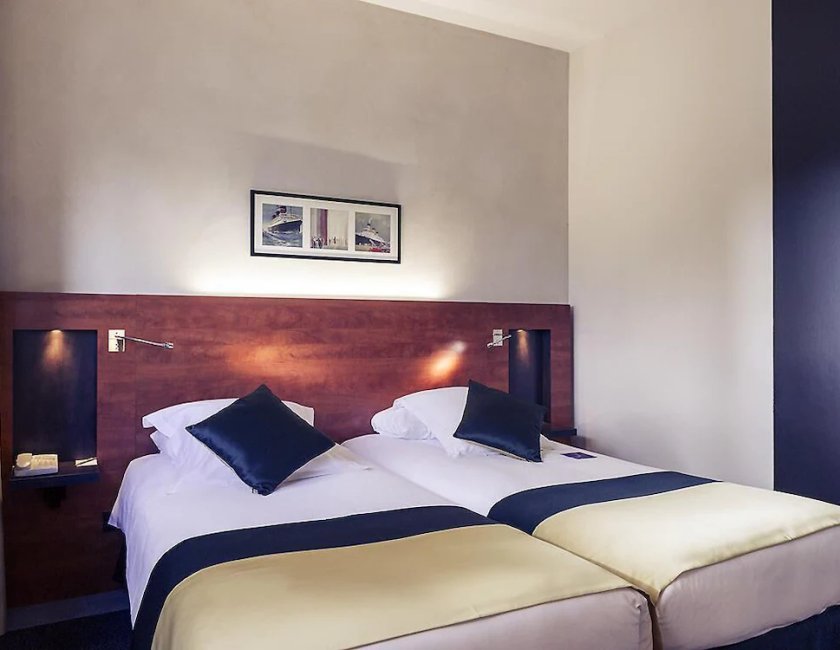 Habitación doble 2 Camas dobles del hotel Mercure Maurepas Saint Quentin. Foto 5