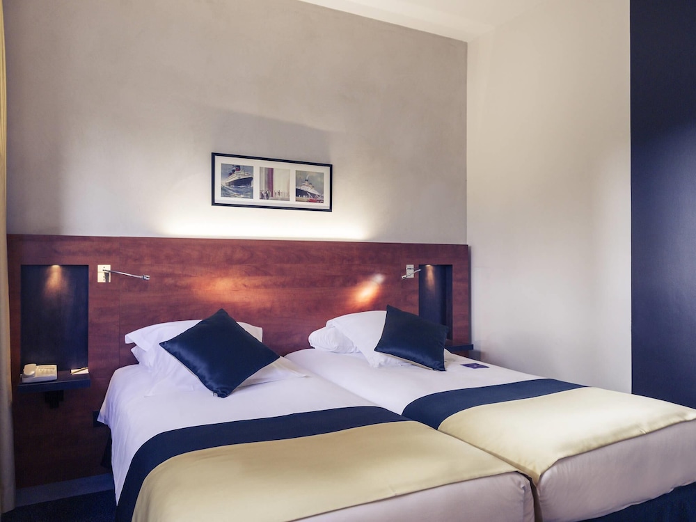 Habitación estándar con camas individuales del hotel Mercure Maurepas Saint Quentin