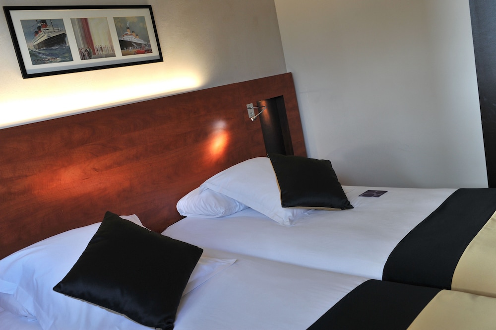 Habitación estándar con camas individuales del hotel Mercure Maurepas Saint Quentin. Foto 2