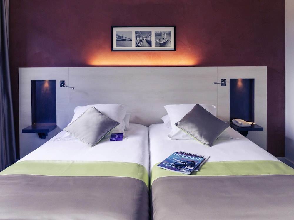 Habitación estándar con camas individuales del hotel Mercure Maurepas Saint Quentin. Foto 3