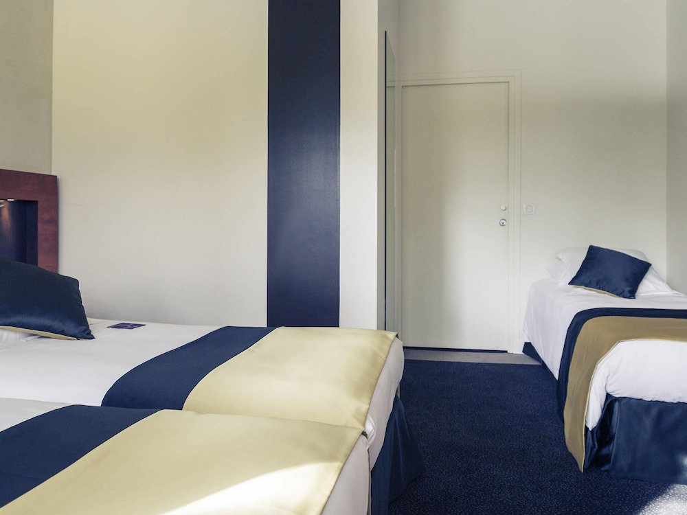 Habitación Triple del hotel Mercure Maurepas Saint Quentin. Foto 6