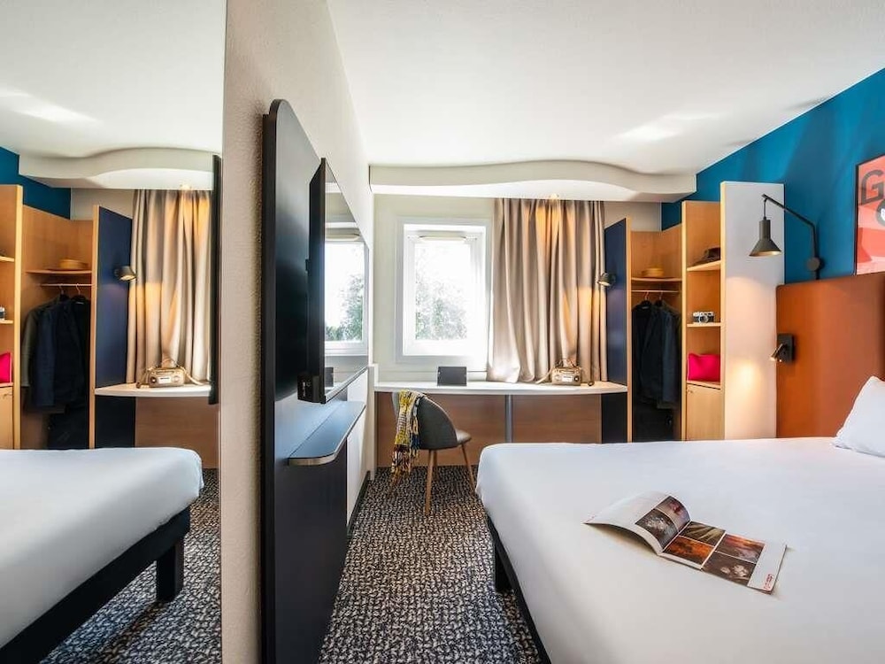 Habitación Standard con una cama doble del hotel Ibis Chalon Sur Saone Nord. Foto 9