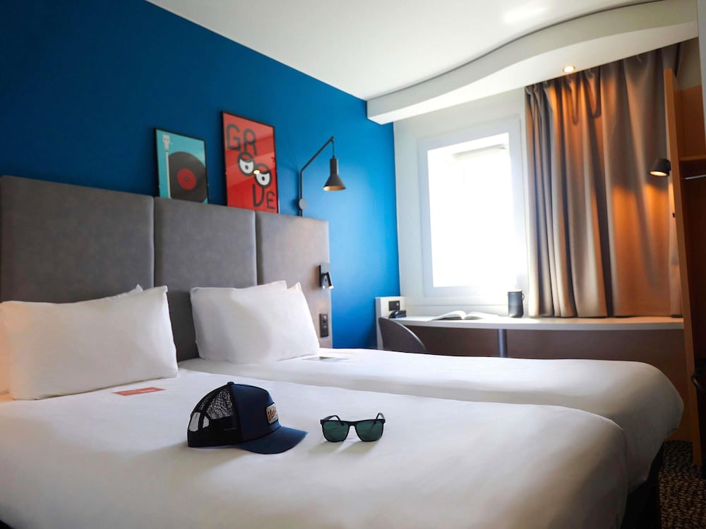Habitación Standard con dos camas individuales del hotel Ibis Chalon Sur Saone Nord. Foto 6