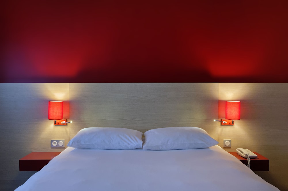 Habitación Standard con una cama doble del hotel Ibis Styles Chalon Sur Saone. Foto 2