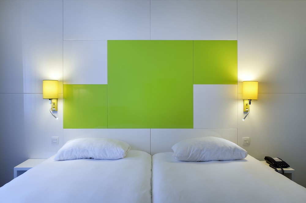 Habitación Standard con 2 camas individuales del hotel Ibis Styles Chalon Sur Saone. Foto 3