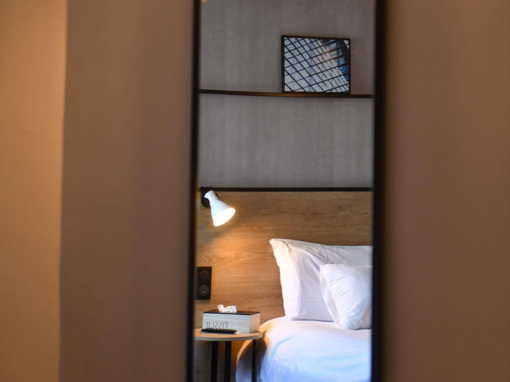 Habitación estándar con 2 camas individuales del hotel Ibis Chateauroux. Foto 4