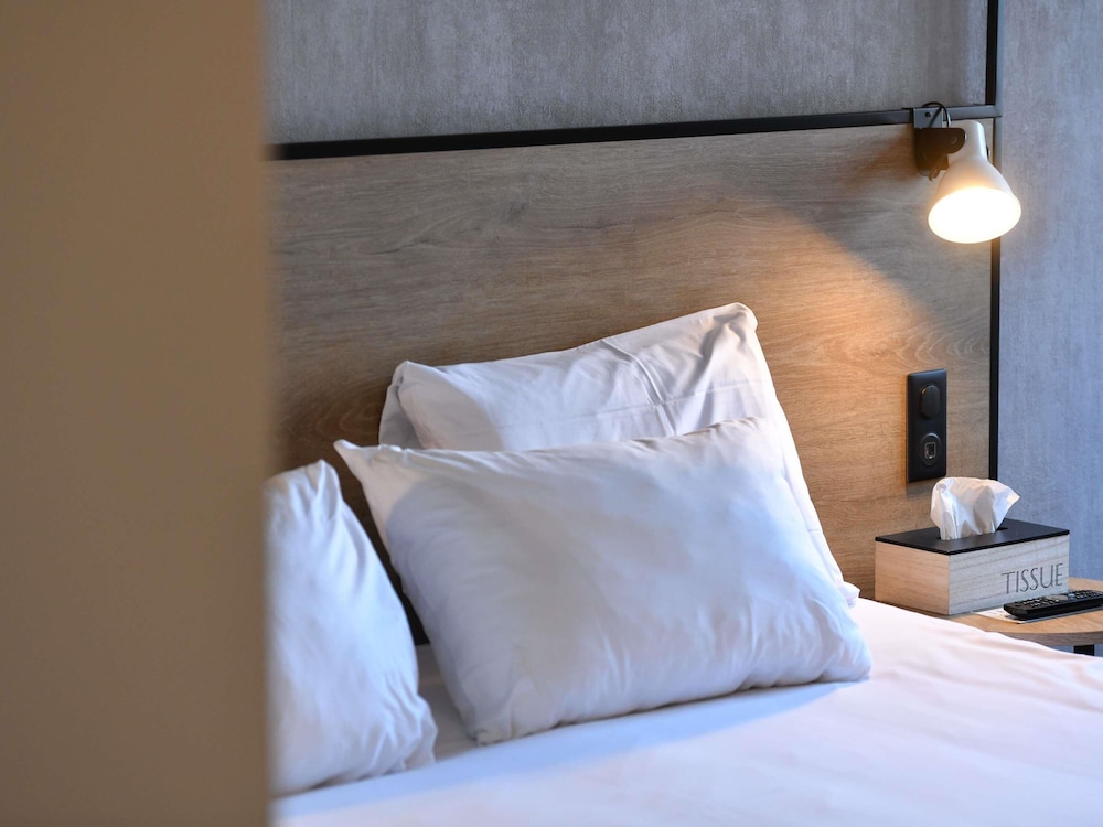 Habitación estándar con 2 camas individuales del hotel Ibis Chateauroux. Foto 6